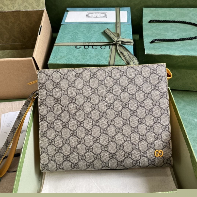 G*u*i clutch bags